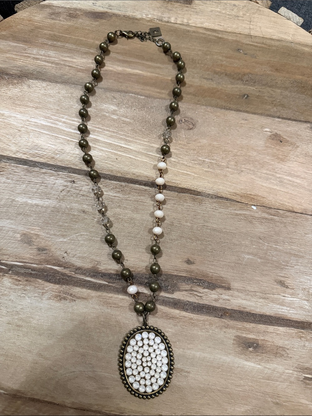 Bronze and White Beaded Pendant Necklace with Crystal Oval Accent